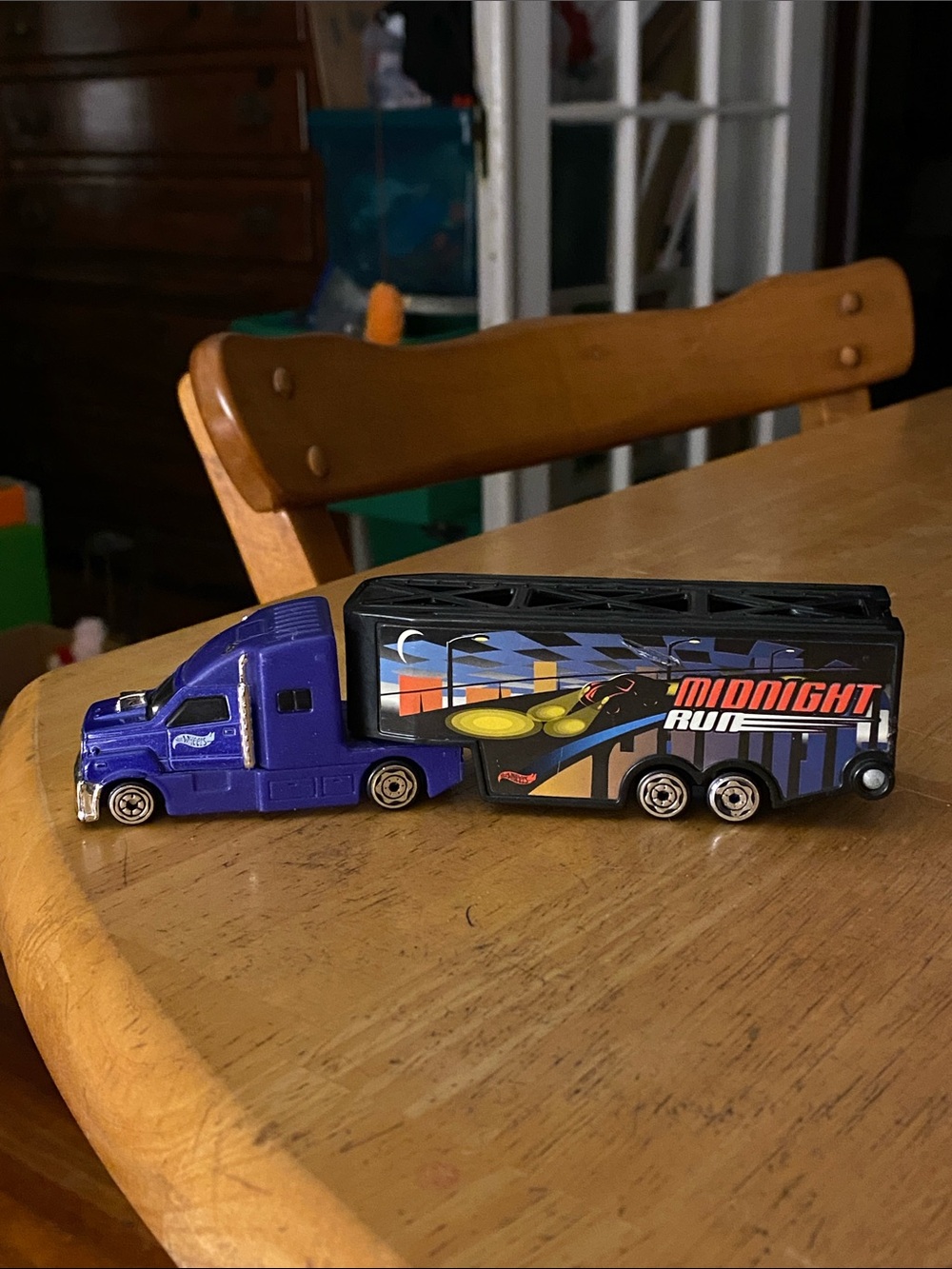 Hot Wheels Midnight Run hauler, which is part of their track-compatible toy truc